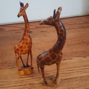 2 wooden giraffe